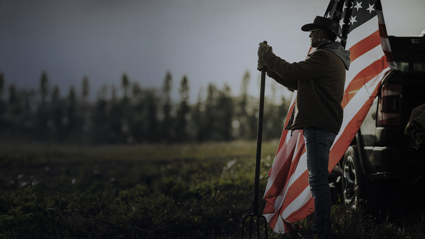 Little girl holding the hand of a man in military uniform